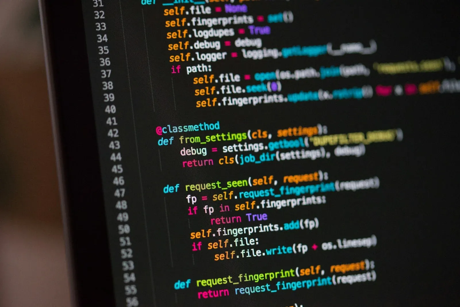 Python source code displayed on a computer monitor